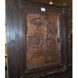 A late 19th century low relief carved oak single door hanging corner cupboard inscribed 'Old