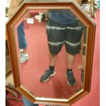 A quantity of 20th century wooden framed wall mirrors,