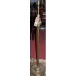 An Edwardian brass standard lamp