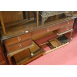 A Stag Minstrel long kneehole dressing table,