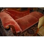 A mid-Victorian mahogany and upholstered buttonback scroll-end chaise-longue,