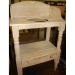 A reclaimed pine three quarter gallery back two-tier wash stand, having single lower drawer,