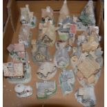 A box of loose David Winter cottage ornaments