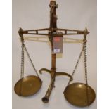 A pair of early 20th century brass beam scales,