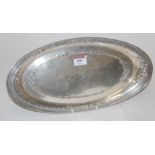 A George V silver tray of oval form having raised swag and bow decoration by Willmott Manufacturing