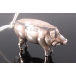 An Edwardian silver novelty pin cushion, in the form of a pig, maker WJM & Co, Birmingham 1909, 4.