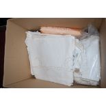 A box of assorted loose linen,