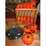 A set of five Le Creuset saucepans and covers,
