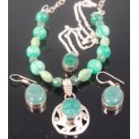 A modern silver beaded jadeite necklace with pendant,