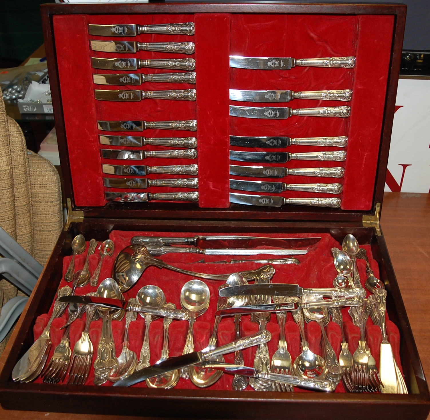 A mid 20th century canteen of silver plated cutlery