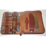 An early 20th century gents leather cased travelling set