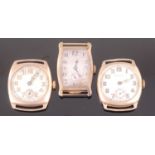 A 9ct gold cased gents tank watch having silver dial,