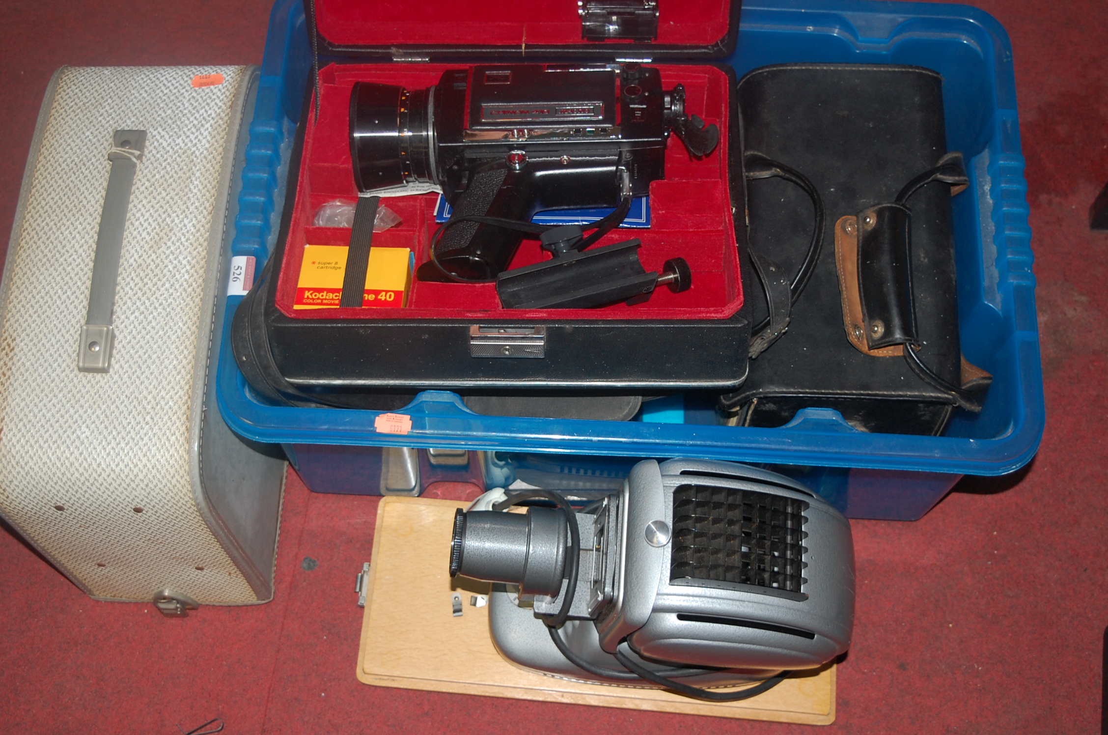 A box of mid-20th century cine cameras and projectors to include; Halina Super 8,
