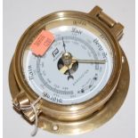 A modern Plastimo brass cased barometer