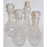 A pair of modern cut glass decanters and stoppers;