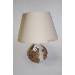 A Bernard Rooke studio pottery table lamp, having applied leaf and bird decoration,