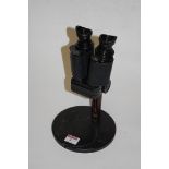 A Russian binocular microscope,
