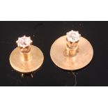 A 15ct gold diamond set dress button, the claw set old brilliant weighing approx. 0.