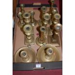 A pair of 19th century turned brass candlesticks;