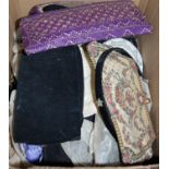 A collection of assorted ladies evening bags and purses,