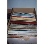 A box of assorted long-playing records to include; Lou Reed Transformer, Marillion,