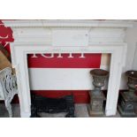 A late Victorian cream painted breakfront fire surround,