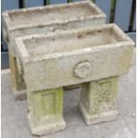 A pair of reconstituted stone rectangular garden planters on pedestals Condition Report /