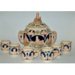 An early 20th century German pottery tureen and cover, relief decorated with various landmarks,