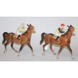 A Beswick figure of a horse and jockey, the jockey in yellow & black silks and red cap, saddle No.