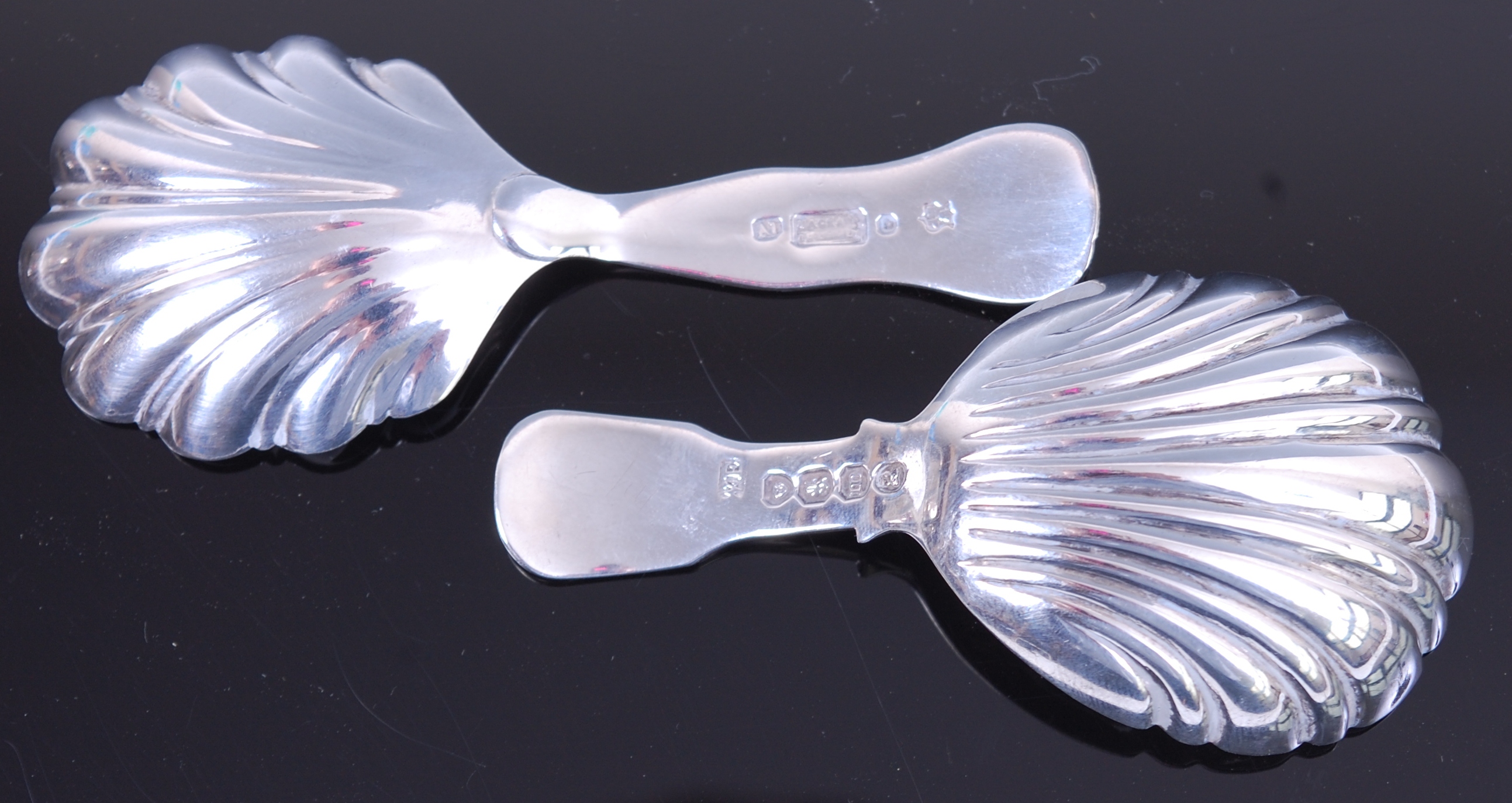 A George IV silver caddy spoon having shell shaped bowl London 1827 together with one other similar - Image 2 of 2