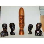 A collection of five various mid 20th century and later carved hardwood tribal busts
