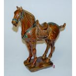 A large Beswick model of a Tang horse in green and brown gloss finish, model No.