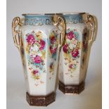 A pair of early 20th century continental twin handled vases of hexagonal form,