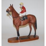 A Beswick figure of Red Rum, Brian Fletcher up, model No.