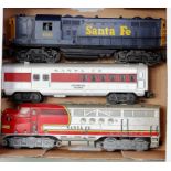 A small tray of Lionel American outline Santa Fe items including bogie red/silver diesel outline