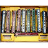 16 boxed Trix 00 Gauge Coaches and Rolling Stock, mixed liveries and regions, to include No.