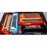 20 various boxed OO and HO Gauge rolling stock and diesel locomotives,