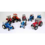 8 assorted loose Britains Tractors, mixed examples to include Ford 5610, Ford 7710,
