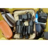 A quantity of mixed camera equipment to include Canon EOS 620 camera, two pairs of cased binoculars,