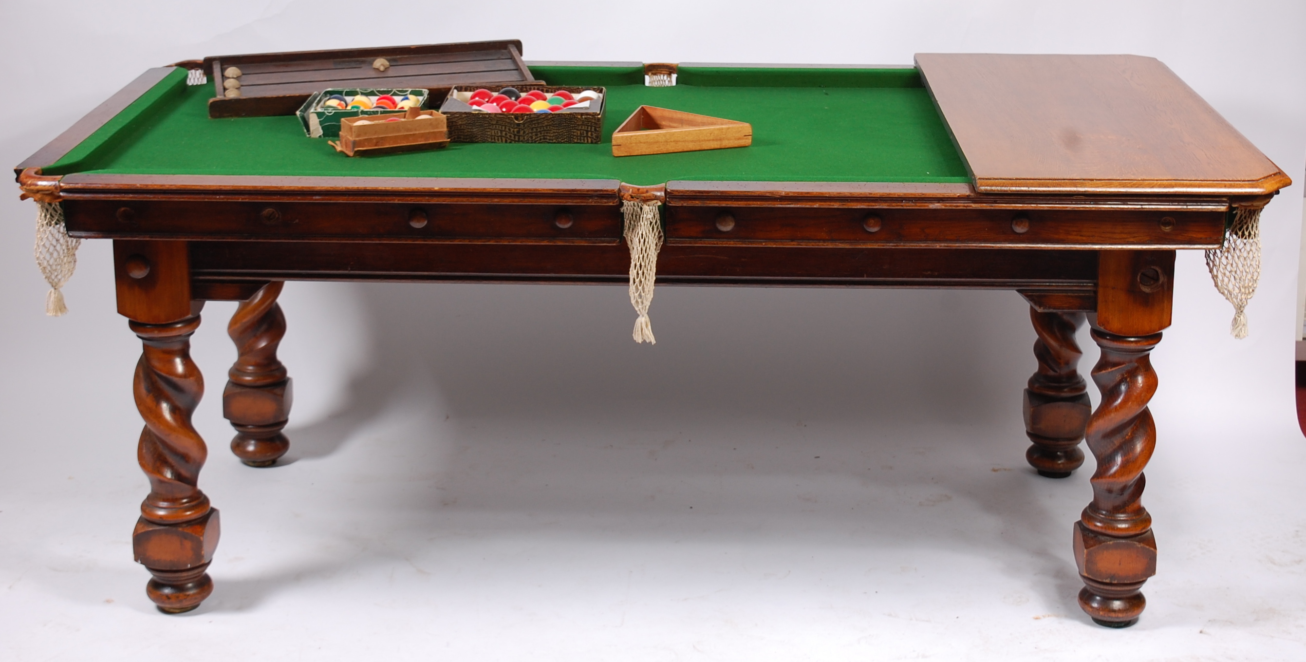 An early 20th century 'The Challenge' oak quarter-size billiard table ...