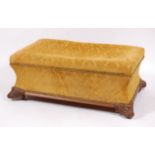 An early Victorian mahogany framed and upholstered box ottoman, of waisted form,