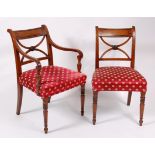 A set of eight late Georgian mahogany barback dining chairs, each with ebony stringing,