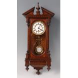 A late Victorian Tunbridge marquetry inlaid Vienna style wall clock, of small proportions,