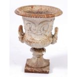 A Victorian cast iron pedestal compagna jardiniere, having scroll cast frieze,