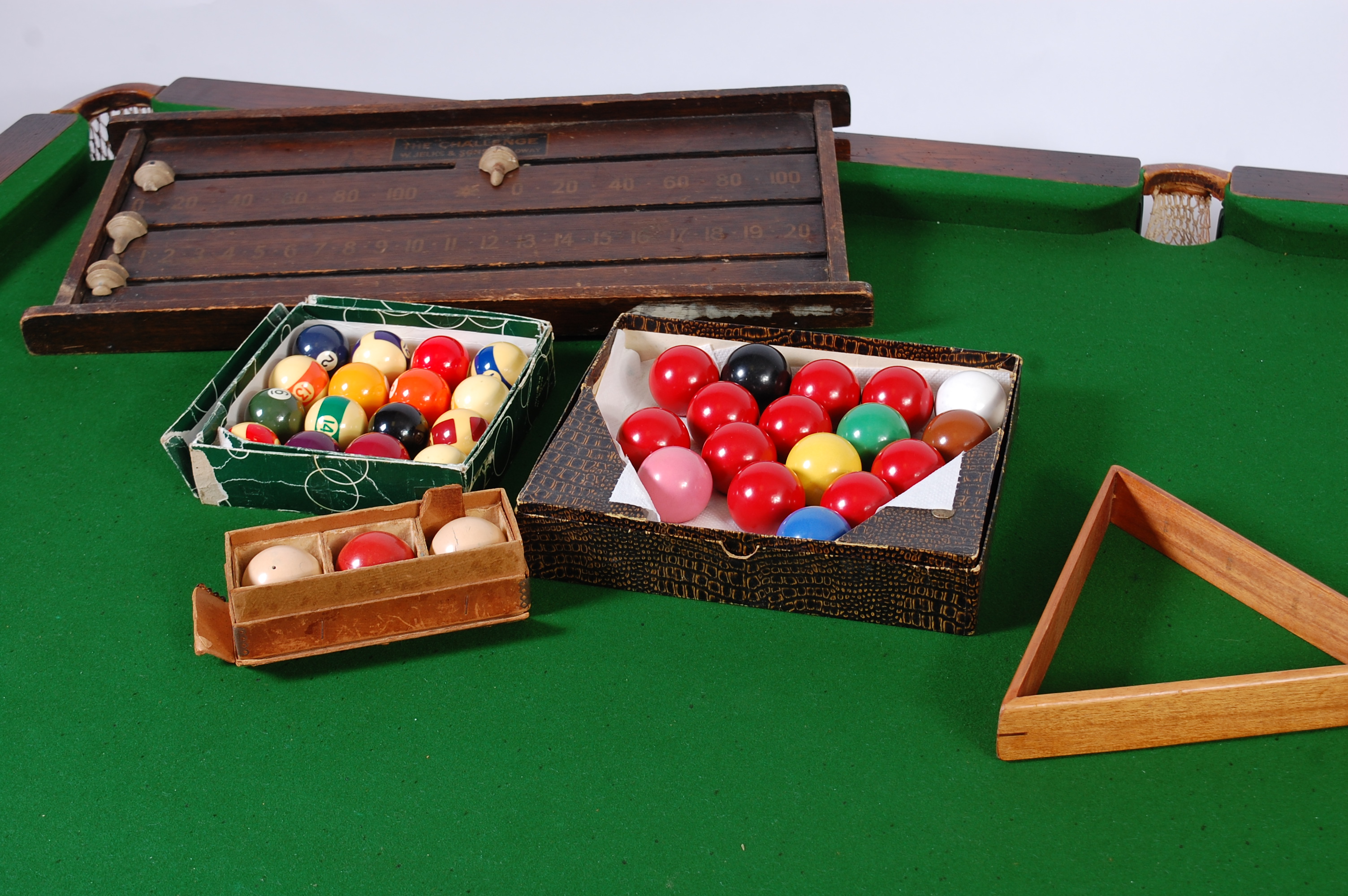 An early 20th century 'The Challenge' oak quarter-size billiard table ...
