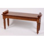 A Victorian style oak window seat, on turned, knopped and reeded tapering supports, w.106cm, d.