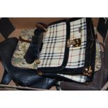 A ladies Burberry style black leather and chequered handbag;