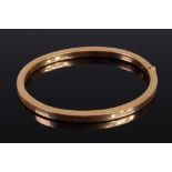 A 9ct hollow gold hinge bangle being square cut, undecorated, 11.7g, dia. 6.