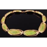 A Trifori gilt metal and enamelled necklace, stamped,