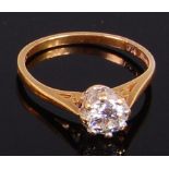 An 18ct gold diamond solitaire ring, the claw set brilliant weighing approx. 0.5ct, 2.